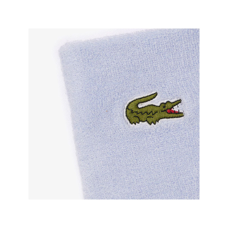 Poignets éponge Lacoste bleu ciel
