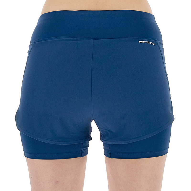 Short de tennis femme Lotto D1 Tech bleu marine avec shorty intégré