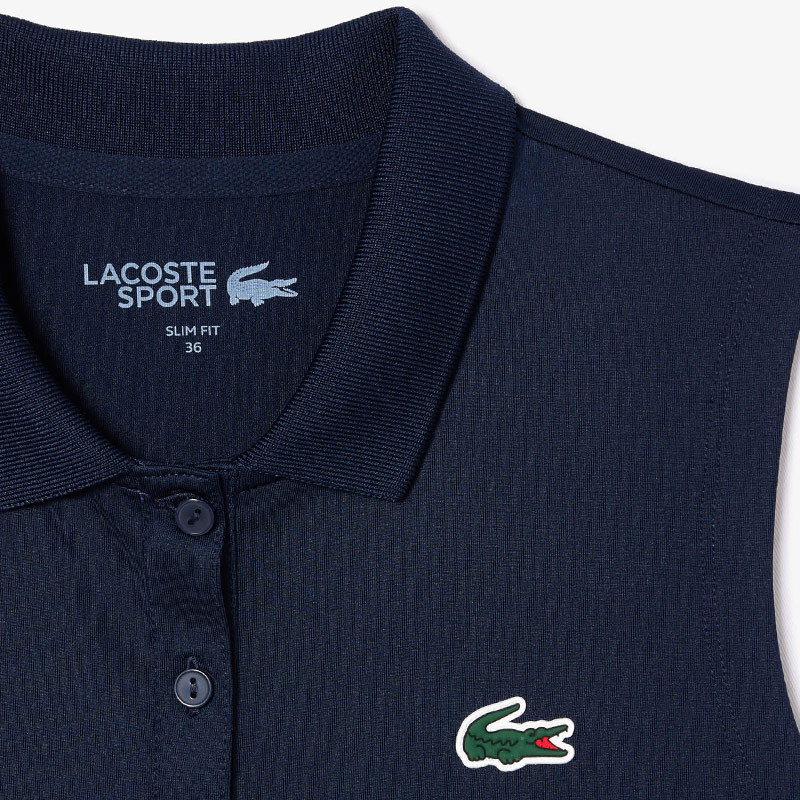 Polo Lacoste Sans Manche Tennis Femme bleu marine