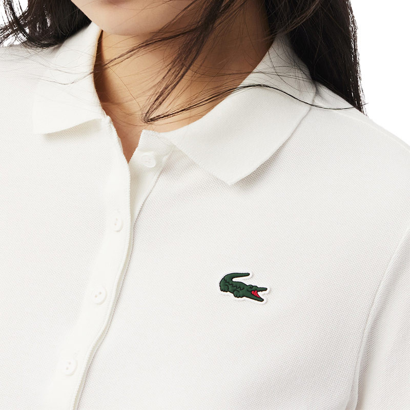Polo lacoste pour femme coloris blanc