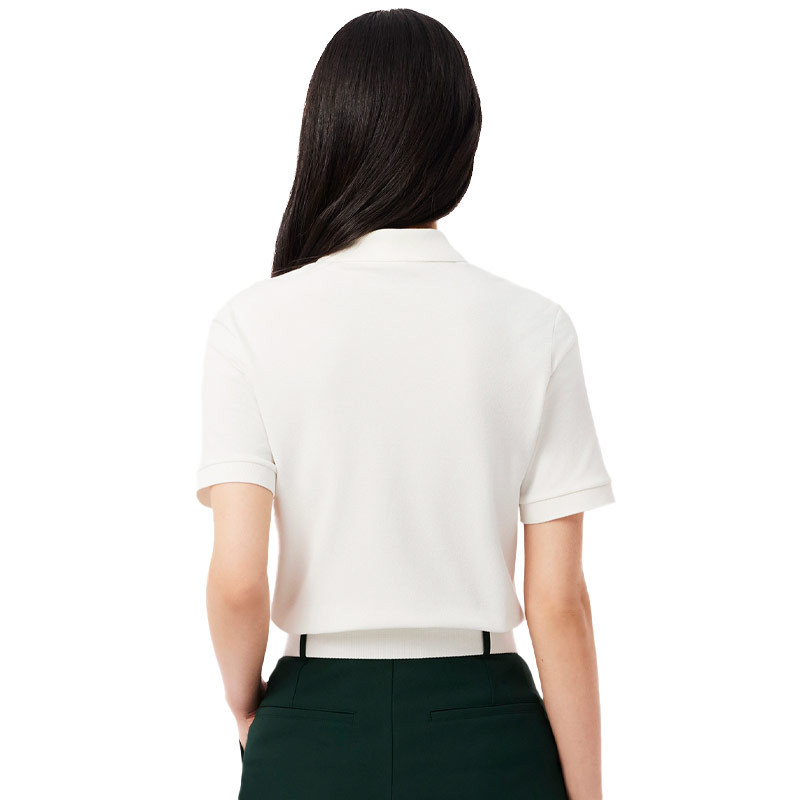 Polo lacoste pour femme coloris blanc