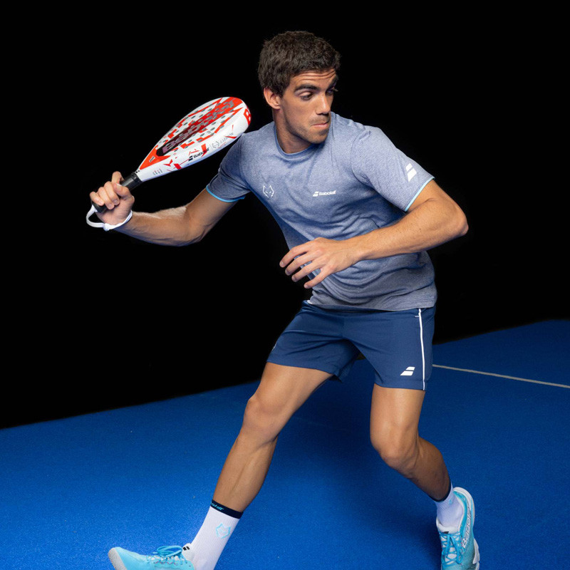Short de padel Babolat Juan Lebron coloris bleu marine et blanc