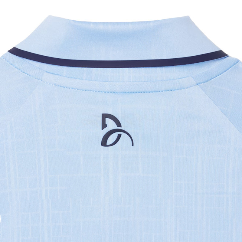 Polo Lacoste x Novak Djokovic US Open session jour bleu clair