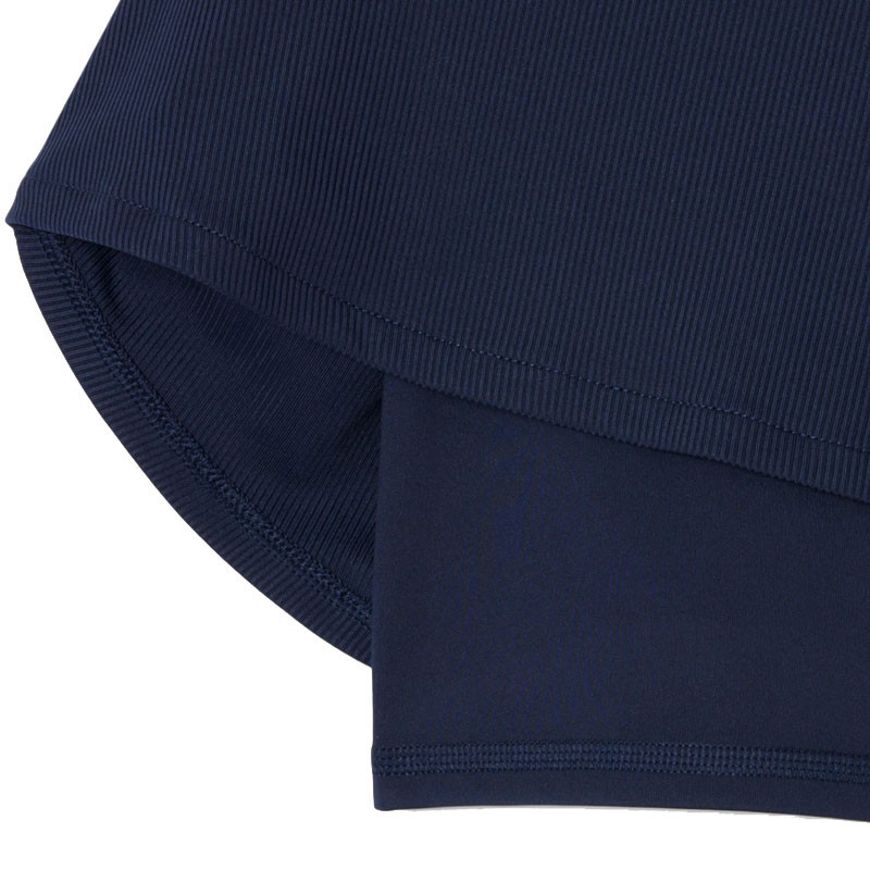 Jupe de tennis femme Lacoste Ultra Dry bleu marine avec shorty intégré
