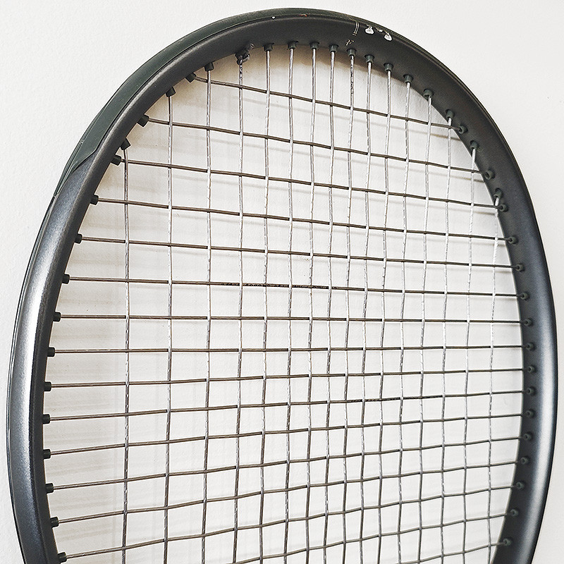 Belle raquette de tennis d'occasion Wilson RF 01 en manche 2