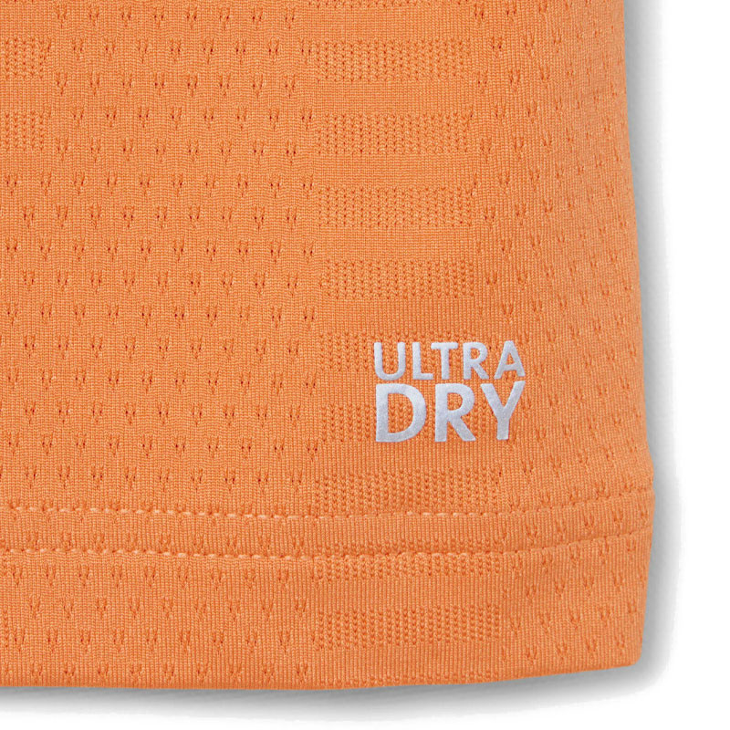 Polo de Tennis Lacoste Ultra-Dry orange : L'élégance et la performance