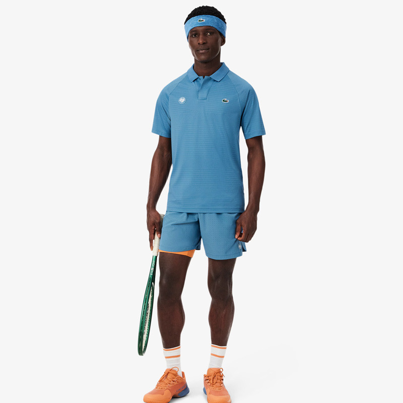 Polo Lacoste Roland Garros bleu