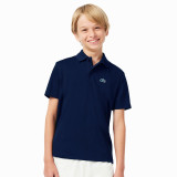 Polo de tennis enfant Lacoste Sport Ultra Dry piqué bleu marine