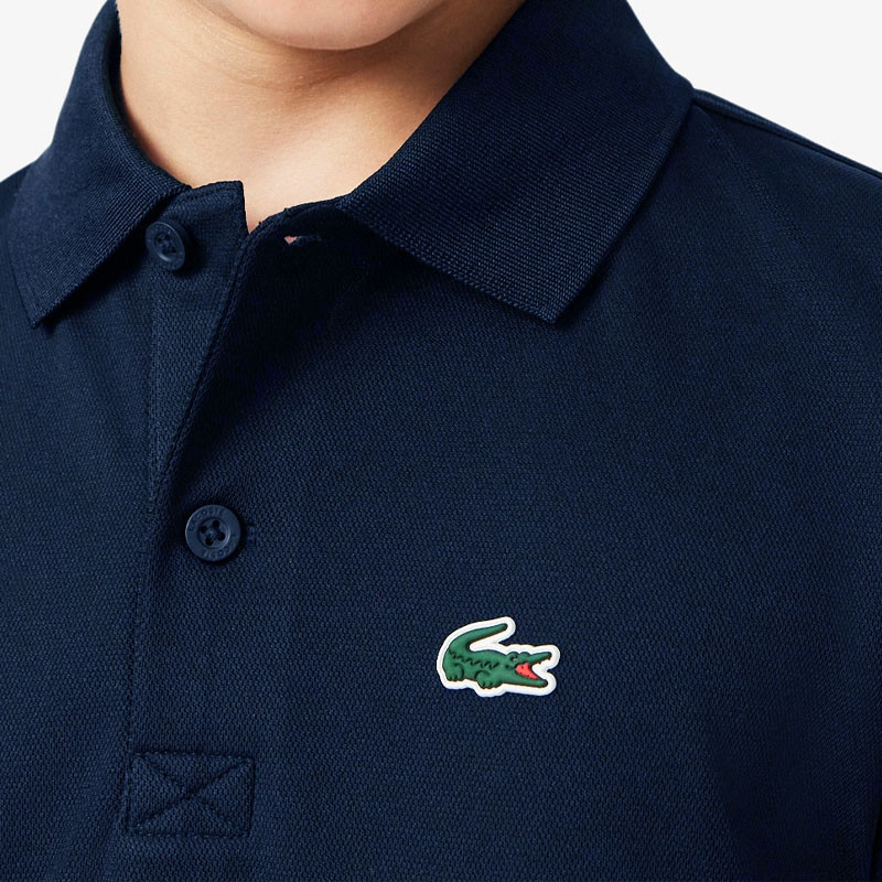 Polo de tennis enfant Lacoste Sport Ultra Dry piqué bleu marine